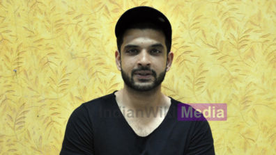 Karan Kundra smiles post FB Live session with IndianWikiMedia