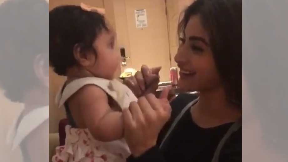 Mouni Roy playing with a kid will make your day!