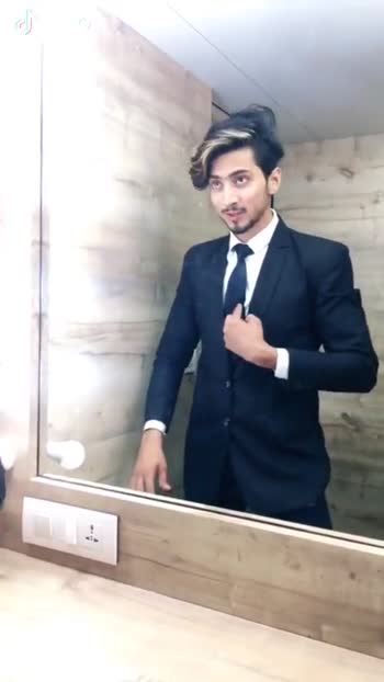 TikTok star Faisu and his suit looks - 1