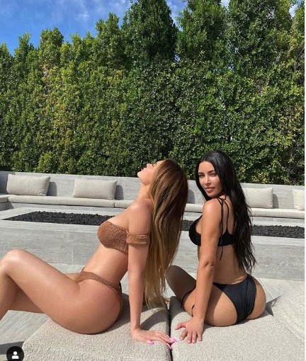 Kylie Jenner And Kim Kardashian Flaunting Their Curves In A Hot Bikini! - 0