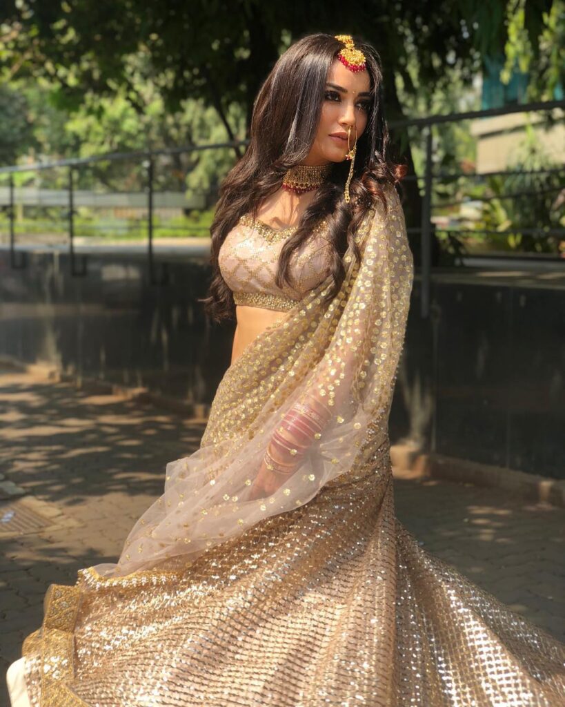 Naagin fame Surbhi Jyoti wows in these shimmery outfits - 1