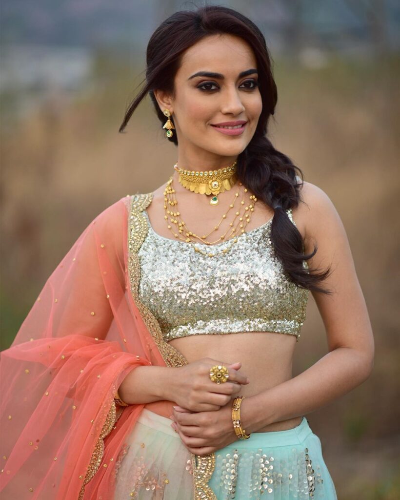 Naagin fame Surbhi Jyoti wows in these shimmery outfits - 3