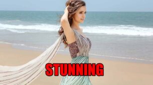 What is Sanaya Irani doing on the beach?