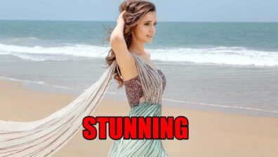 What is Sanaya Irani doing on the beach?