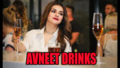Cheers: Avneet Kaur drinks in a bar