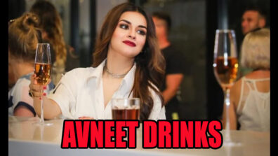 Cheers: Avneet Kaur drinks in a bar