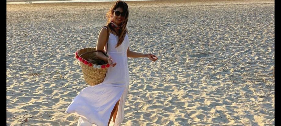 Kaisi Yeh Yaarian’s Niti Taylor enjoys on the beach wearing a white dress