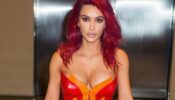 Red Hot: Kim Kardashian’s latest strapless red shimmery outfit will make you feel the heat