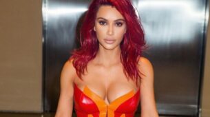 Red Hot: Kim Kardashian’s latest strapless red shimmery outfit will make you feel the heat