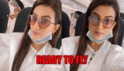 Watch Akshara Singh As She Takes A Flight Covered With Safety Clothes