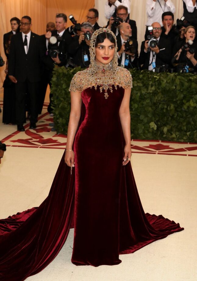 Aishwarya Rai Bachchan Or Priyanka Chopra: Who Has The Attractive Looks In Wine Hued Gown? - 0