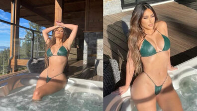 Hottie in pool: Kim Kardashian looks smoking hot in green bikini