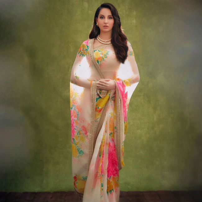 Nora Fatehi From Bikinis To Sarees: A Diva Full Of Hotness - 2