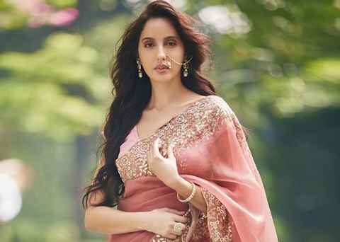 Nora Fatehi From Bikinis To Sarees: A Diva Full Of Hotness - 3