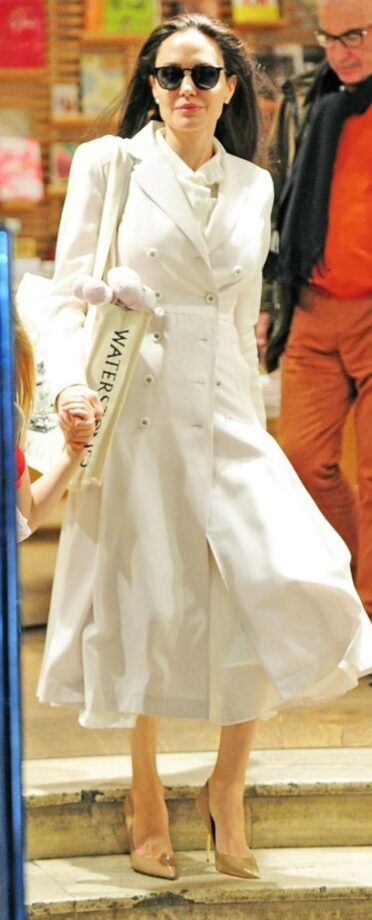 Angelina Jolie looks beautiful in a white dress and trench coat: See Pics - 1