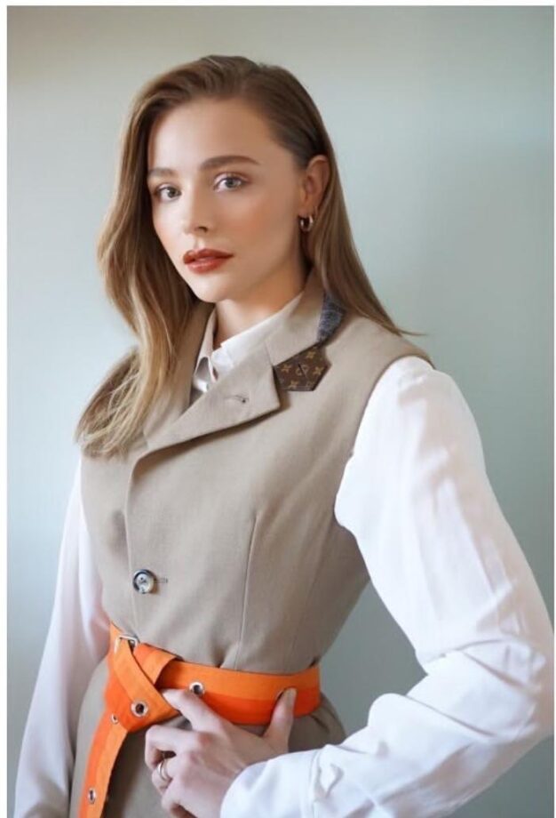 Chloe Moretz Looks Amazingly Gorgeous In Her White Shirt With Grey Blazer And Orange Belt, See Here - 0