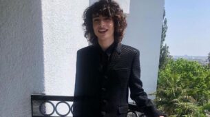 Cute Looks Of Finn Wolfhard, Black Blazer With Black And White Striped Pants
