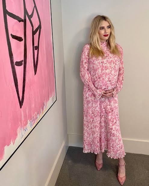 Emma Roberts In Rib-knit Red With Pink Floral Print Showing Off Her Baby Bump, See Pictures - 0