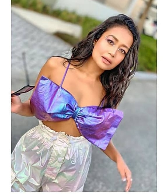 Neha Kakkar Shines In Holographic Bow Top With Holographic Pants - 1