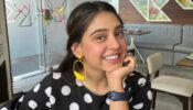 Niti Taylor looks pretty in a polka dot outfit with a pop of yellow earrings