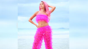 Nora Fatehi raises the heat in her hot pink ruffled strapless crop top with pants, see here