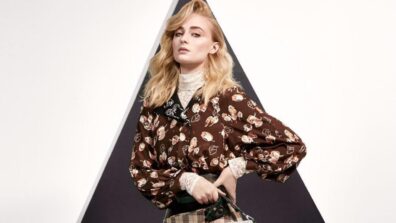 Striking looks of Sophie Turner pairing turtleneck top with LV print tan skirt, see here