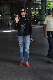 Which Super Stylish Airport Looks Of Sushmita Sen You Liked The Most? Vote Now - 0