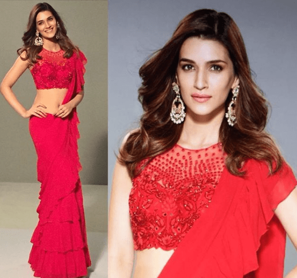 This Or That: Would You Wear A Ruffle Saree Like Kriti Sanon Or Net Saree Like Madhuri Dixit? - 1