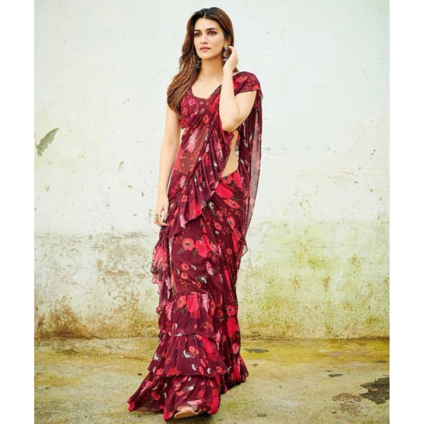 This Or That: Would You Wear A Ruffle Saree Like Kriti Sanon Or Net Saree Like Madhuri Dixit? - 0