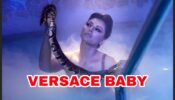 Swim with snake: Urvashi Rautela spotted posing in a swimming pool with a big dangerous snake, fans SHOCKED