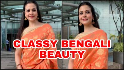 Want to slay in a classy orange embellished saree paired with hoop earrings? Learn from Bengali diva Koel Mallick