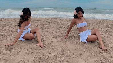 Beach Beauty: Nia Sharma gets playful with sand in a sensuous hot sleevless bralette, see viral video