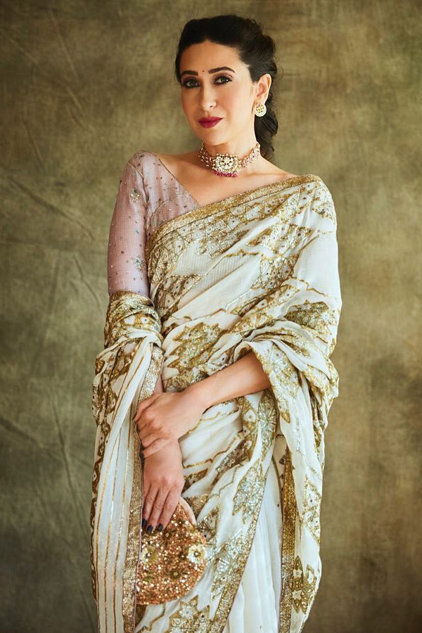 Nobody Can Be Monsoon Ready Without Sarees: From Urvashi Rautela & Karisma Kapoor - 3