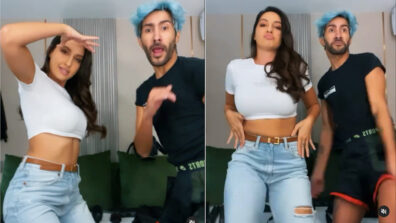 Nora Fatehi does a sensuous booty shake in white crop top & denim jeans with a handsome man, see Hottest Dance video