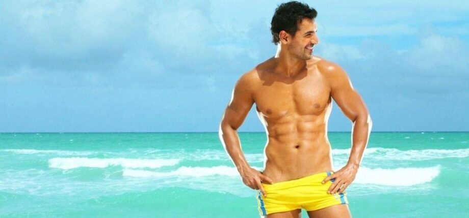 Tiger Shroff Or John Abraham: Who Looks Steaming Hot In Yellow Trunks? - 1