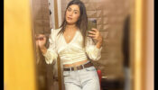 What A Beauty: Hina Khan looks super sensuous in a white crop party shirt & ripped denim, fans go bananas