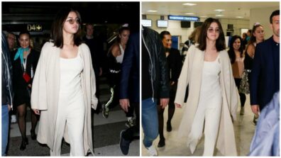 Selena Gomez’s Luxurious Airport Looks Will Shock You- A Ribbed Gray-White Top And Trousers, Chunkier Ivory Sweater On Top, Pointy Boots & Stark White Leather