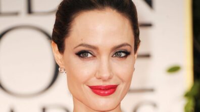 Angelina Jolie kept things sizzling in a sparkly loose fitted maxi dress; see pics