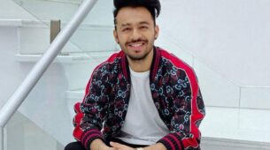 How does Tony Kakkar deal with negativity in life?