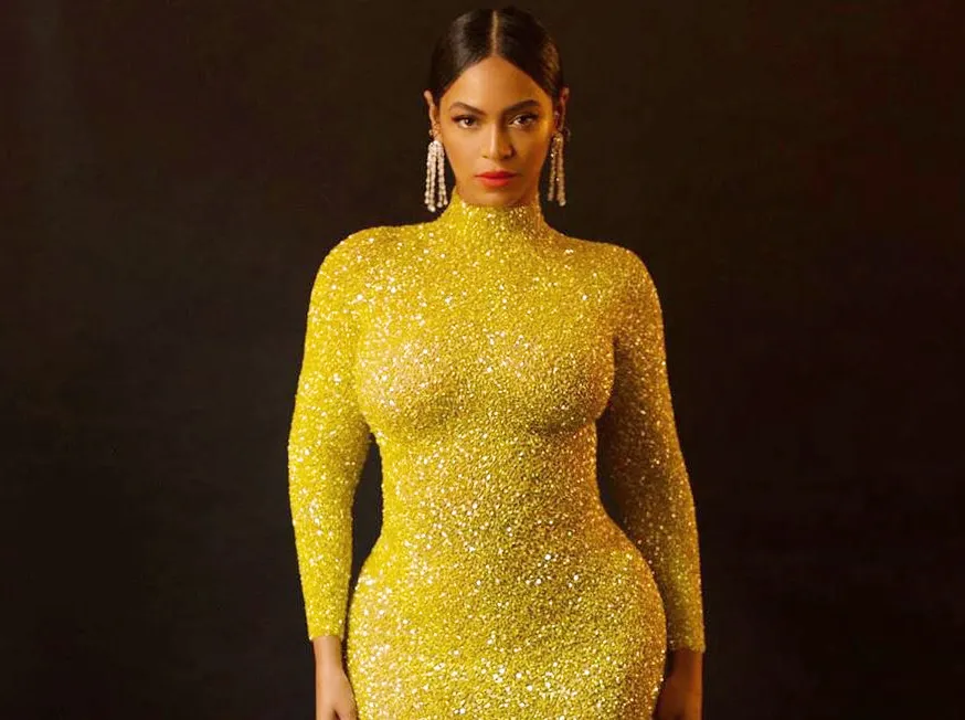 OMG! Beyonce Sets Pulses Racing In a Yellow Body Tight Dress 776889