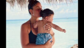 Yummy Mummy: Kareena Kapoor turns back the clock with her super hot black bikini look, fans go aww seeing Jeh in her arms