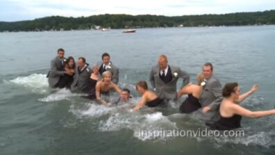 OMG! A Wedding Party Takes A Huge Plunge Into The Water When The Dock They Are Standing On Suddenly Collapses