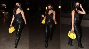 Spotted Alert: Nora Fatehi spotted at the airport in her flawless black leather pant & stripy top with her yellow handbag, view pics