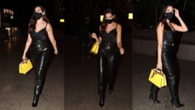 Spotted Alert: Nora Fatehi spotted at the airport in her flawless black leather pant & stripy top with her yellow handbag, view pics