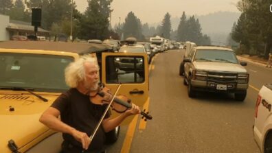 Wow! So Soothing: Like A Scene From Titanic: A Man Plays The Violin For California Wildfire For The Traffic Stuck! Watch