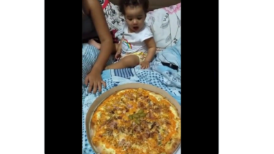 Viral Video: Check Out A Toddler’s Reaction On Getting A Pizza; The Gurgling Laughter Says It All