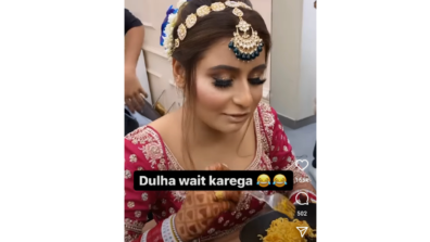 Watch A Viral Video of A quirky bride digging into a bowl of Maggi on her wedding day will make you giggle