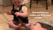 A Funny Video Of A Baby Girl Realising That She Has No Hair Will Leave You In Splits