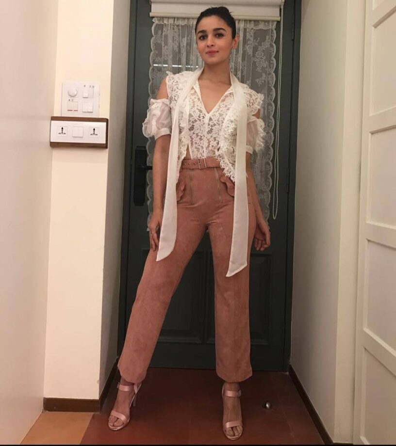 How would you style your brown pants: With a tee for a casual look like Tara Sutaria or with a lace top for a formal look like Alia Bhatt? - 1