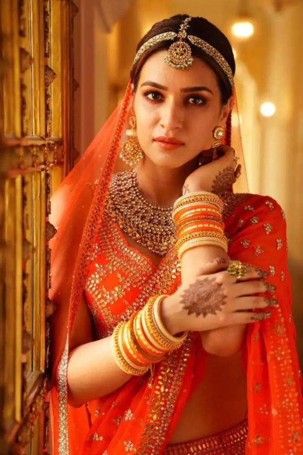 Kriti Sanon Is All Beauty Bride Goal As She Aces In Seema Gujral’s Orange Lehenga - 3